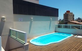 Casa 3 dormitórios sendo uma suíte com ar